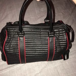 Beautiful black and red L.A.M.B bag